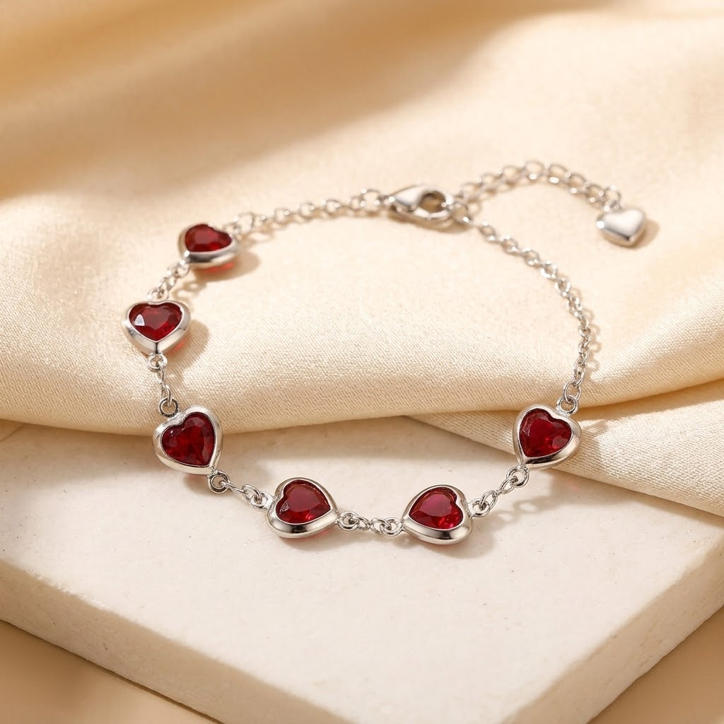 Pulseira de Cadeia em Prata com Coração de Rubi
